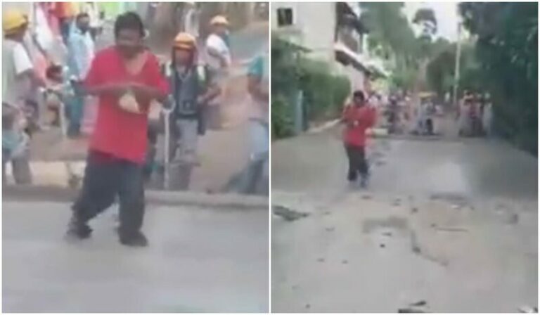 Pria Melintas Di Jalan Yang Baru Selesai Dicor